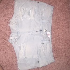 No Boundaries ripped blue jean shorts.